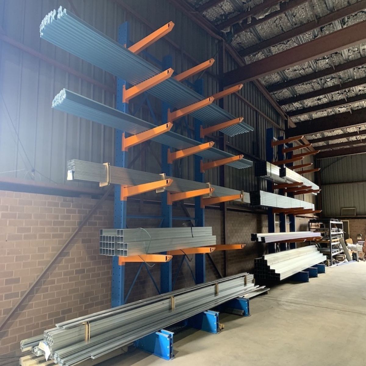 Cantilever racking holding lengths of steel section in the warehouse